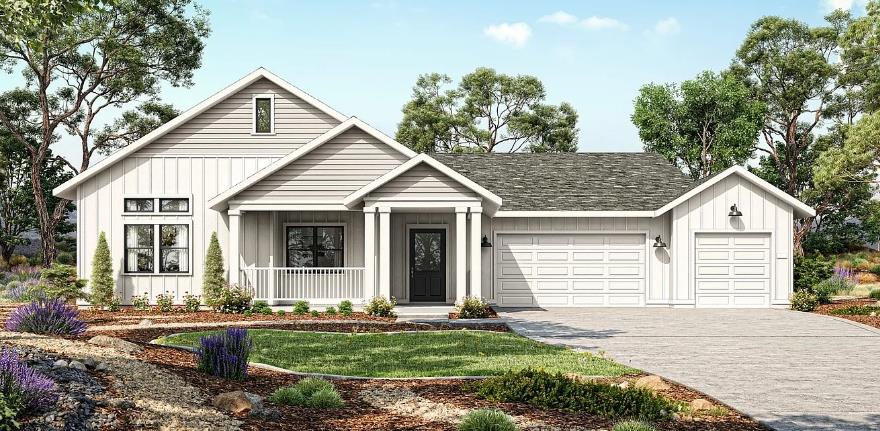 a view of a house with yard and plants