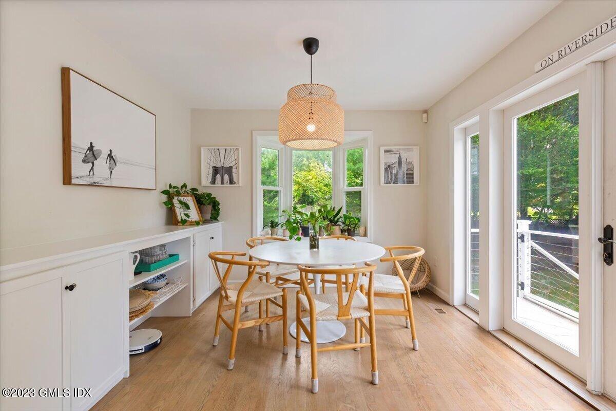 5 Sunshine Avenue Riverside, CT 06878 - Photo 15 of 35 a view of a dining room with furniture window and wooden floor
