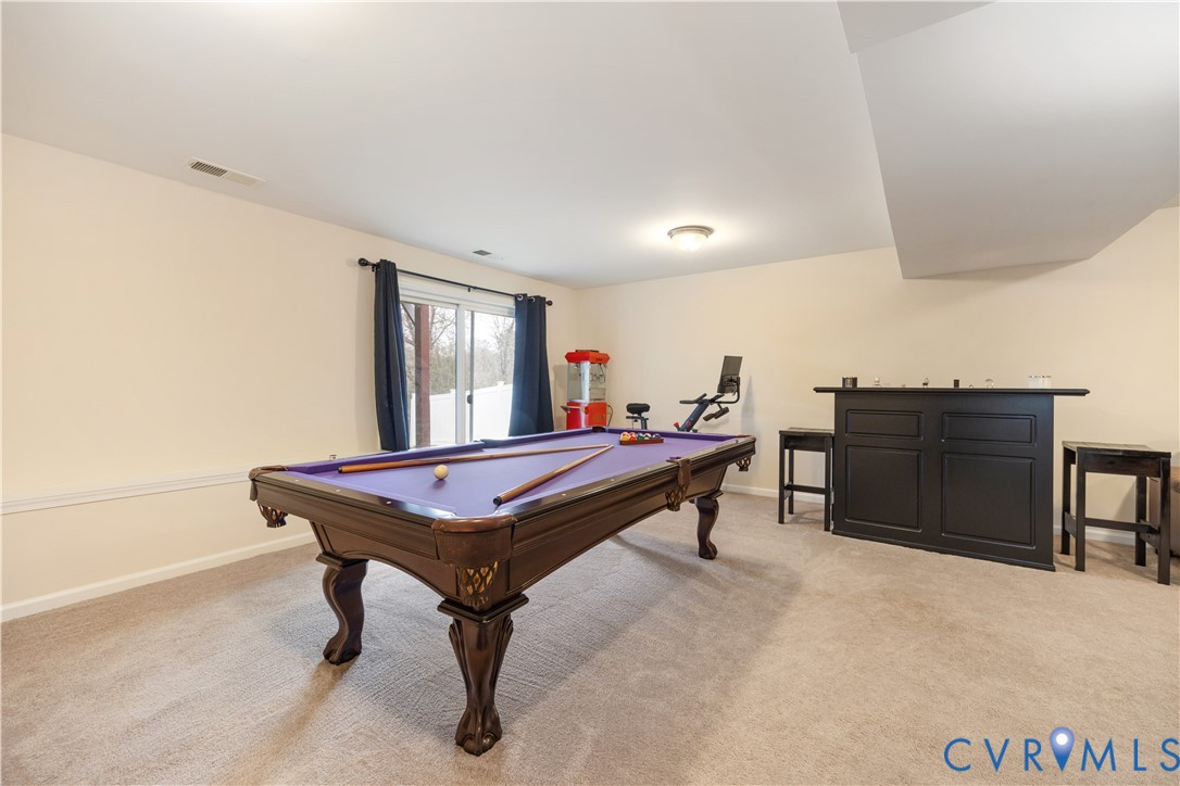 1916 River Ridge Place Hopewell, VA 23860 - Photo 13 of 23 The finished walk-out basement is an added benefit