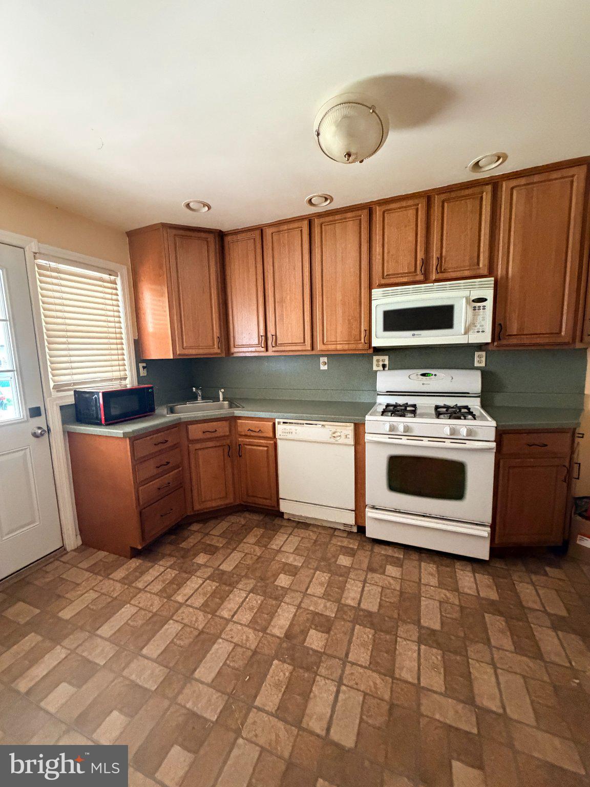 1707 Stokesley Road Baltimore, MD 21222 - Photo 2 of 18 Cozy kitchen with warm wood tones.