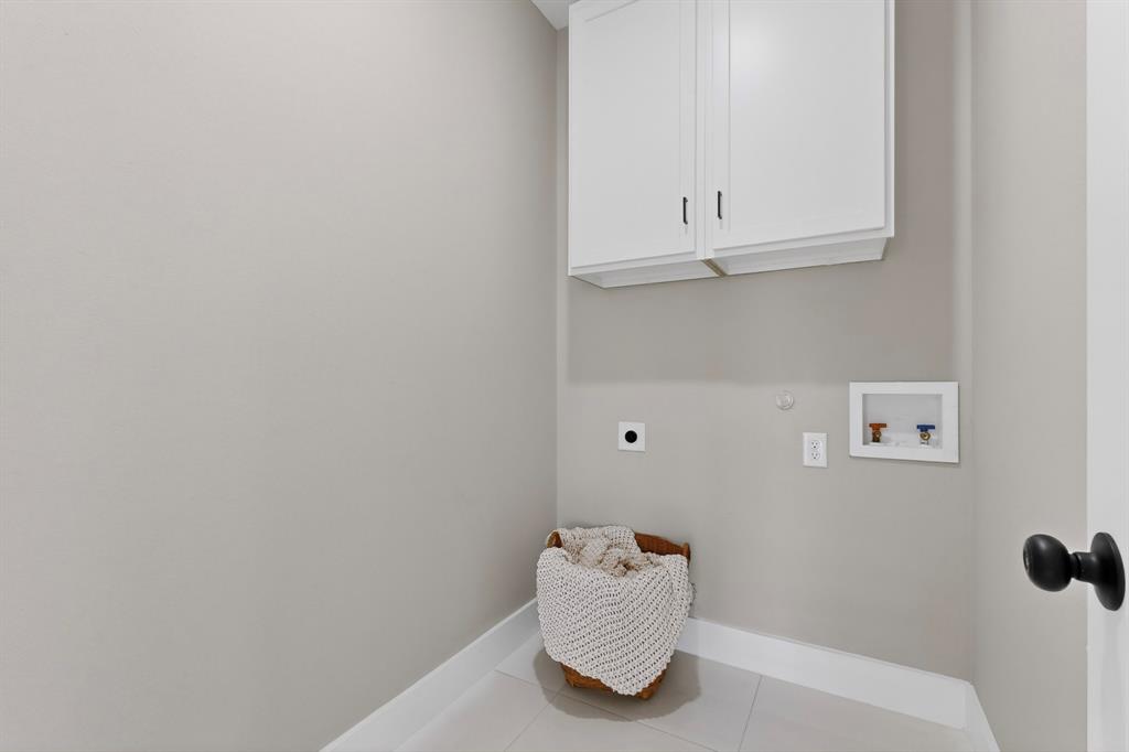 6027 Plum Dale Road Dallas, TX 75241 - Photo 25 of 33 Full washer and dryer connections with storage