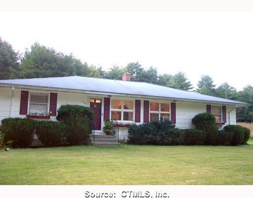 316 River Road Killingly, CT 06241 - Photo 1 of 1 a front view of house with yard and outdoor seating
