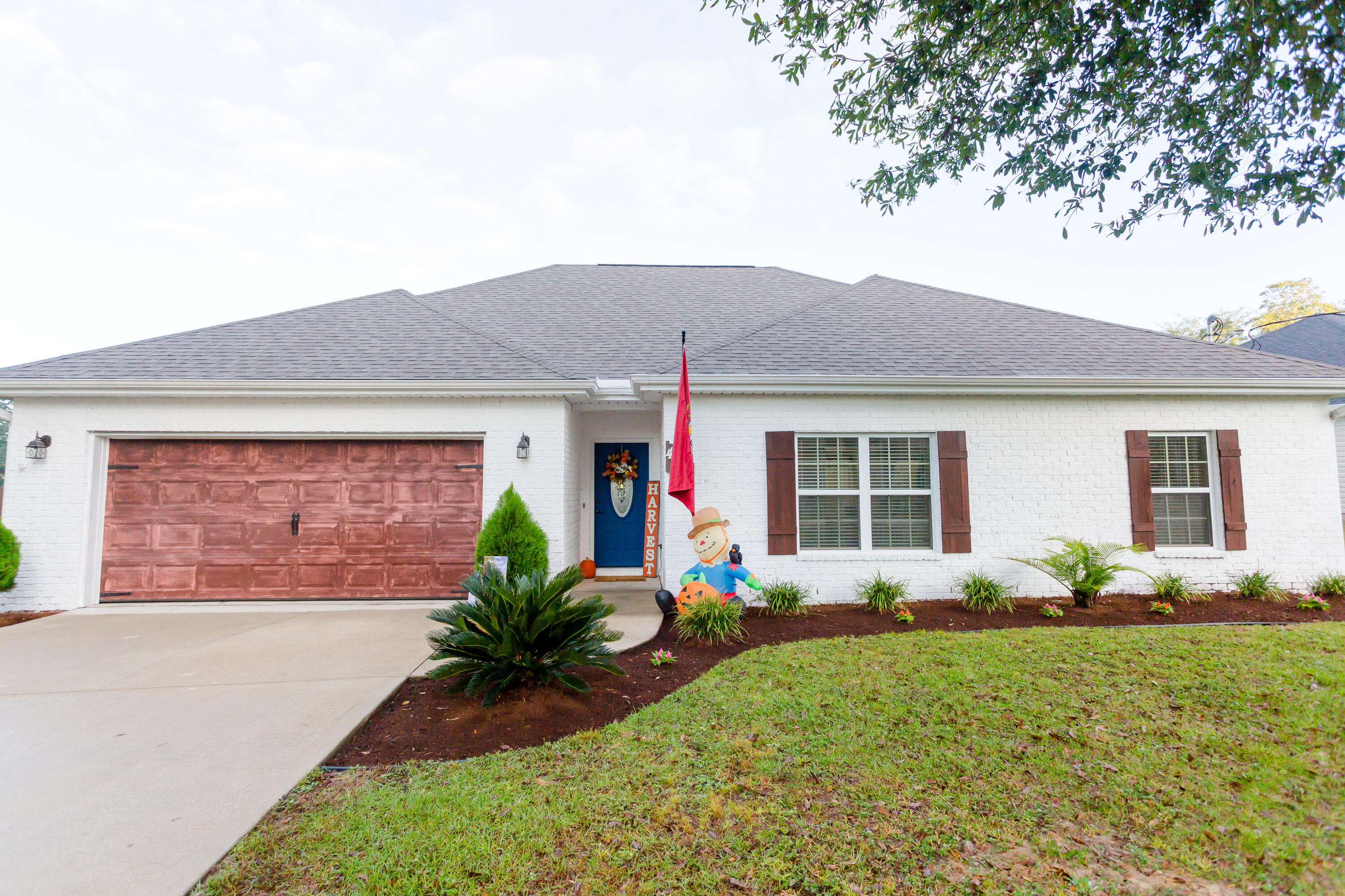 4544 Live Oak Church Road Crestview, FL 32539 - Photo 1 of 31 a front view of house with yard and outdoor seating
