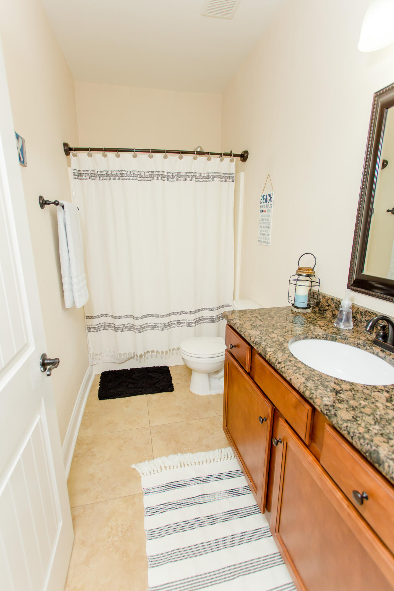 4544 Live Oak Church Road Crestview, FL 32539 - Photo 24 of 31 a bathroom with a granite countertop sink and a mirror