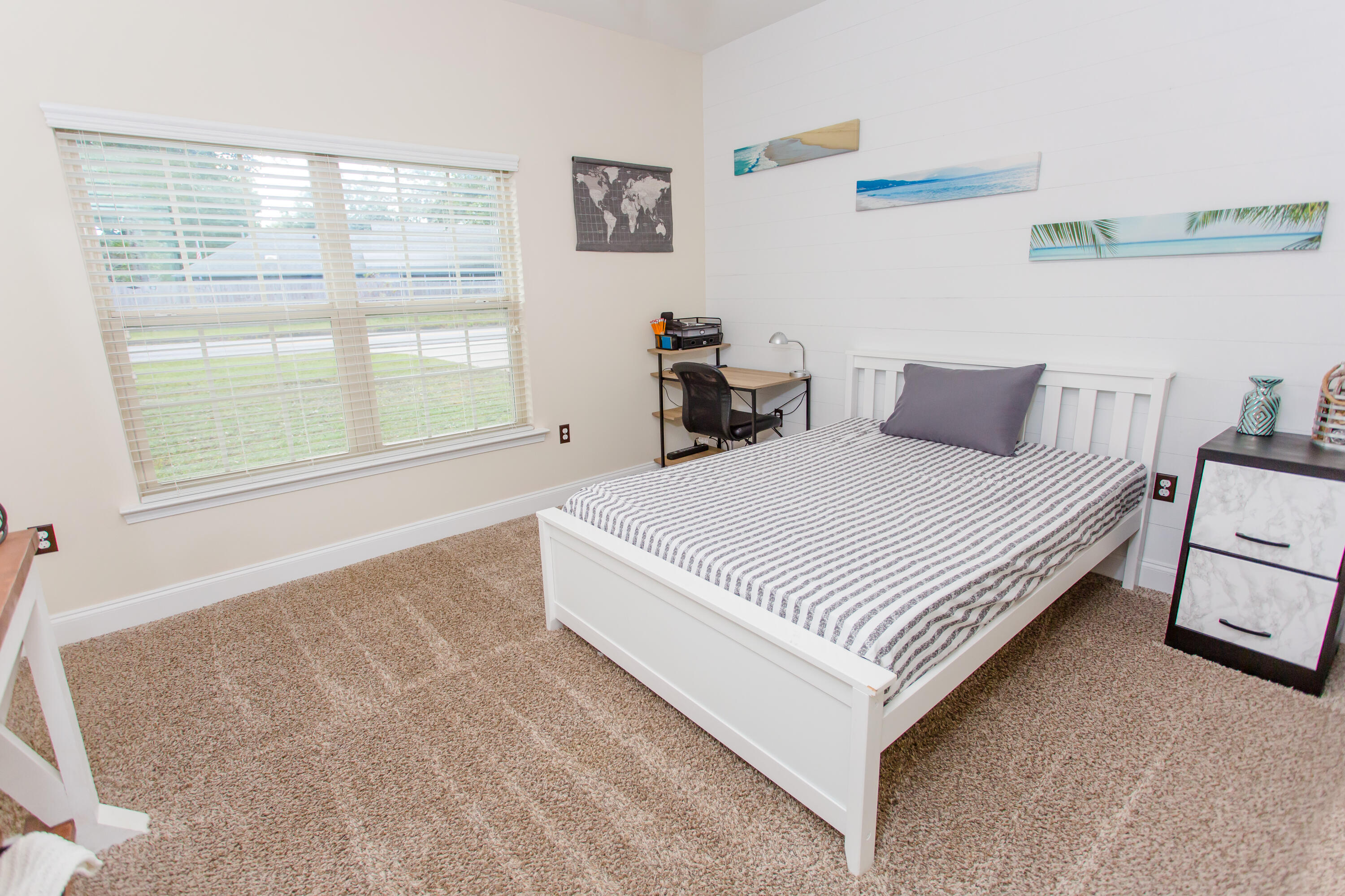 4544 Live Oak Church Road Crestview, FL 32539 - Photo 25 of 31 a large white bed in a white room