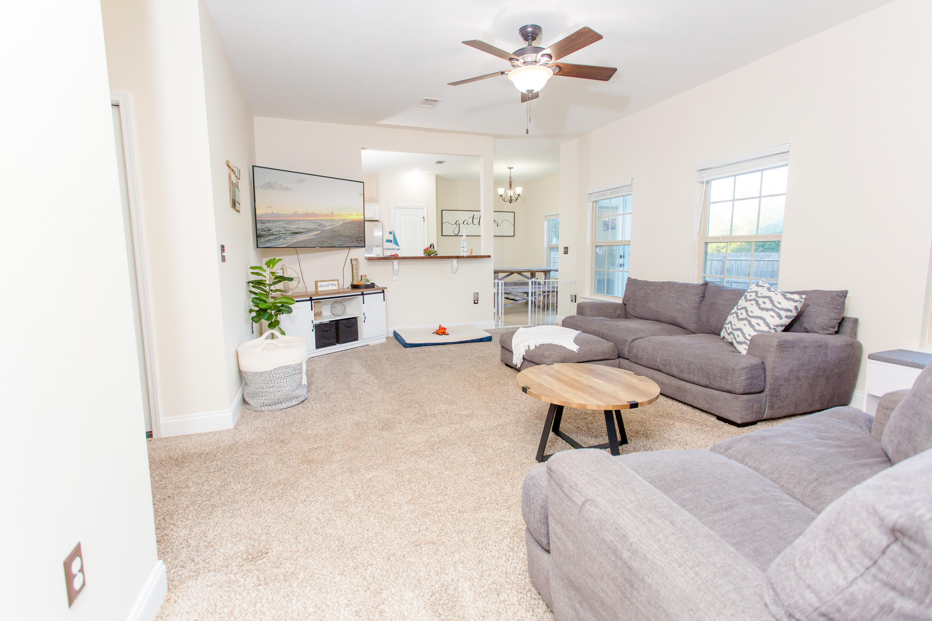 4544 Live Oak Church Road Crestview, FL 32539 - Photo 7 of 31 a living room with furniture and a large window