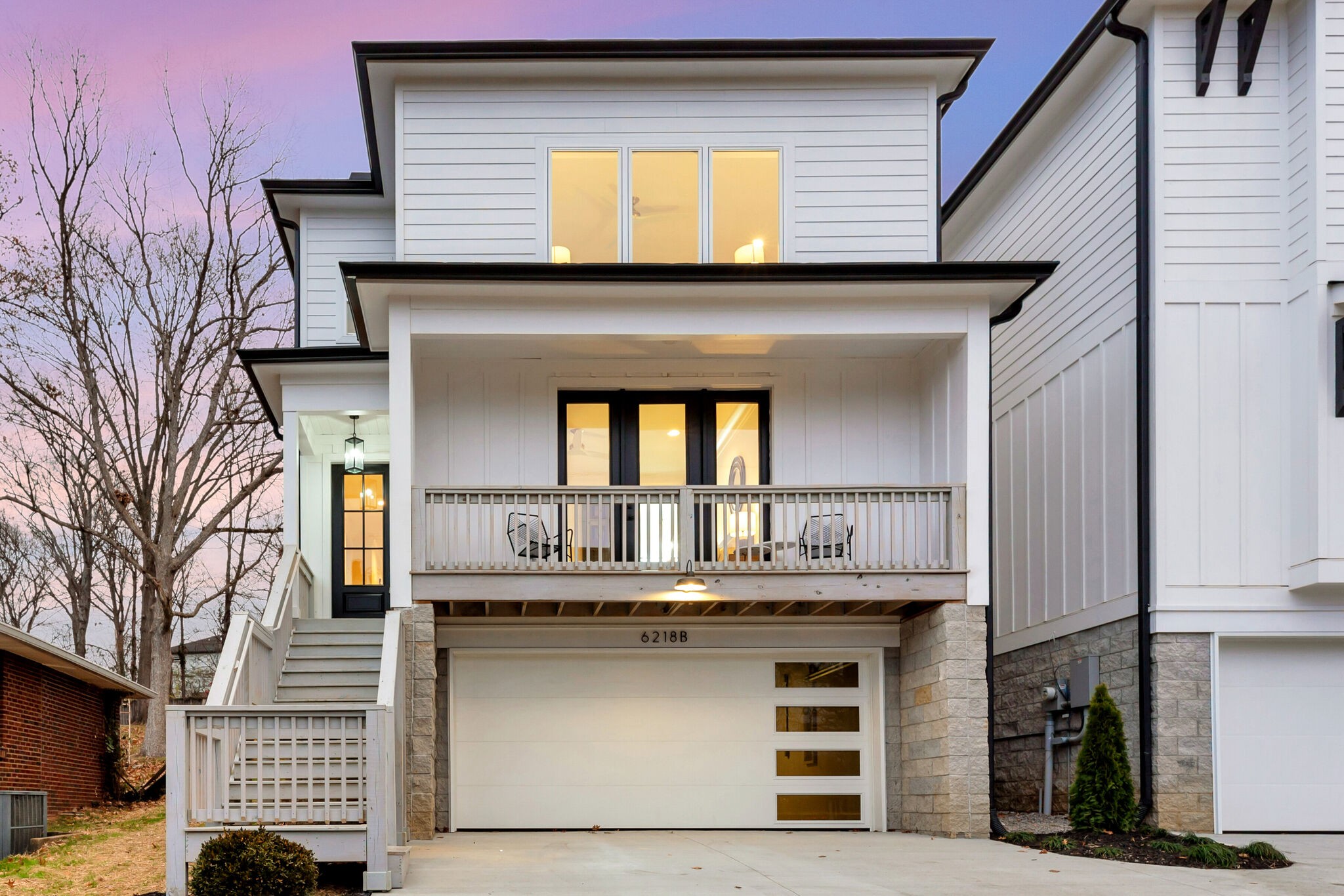 a front view of a house with a balcony