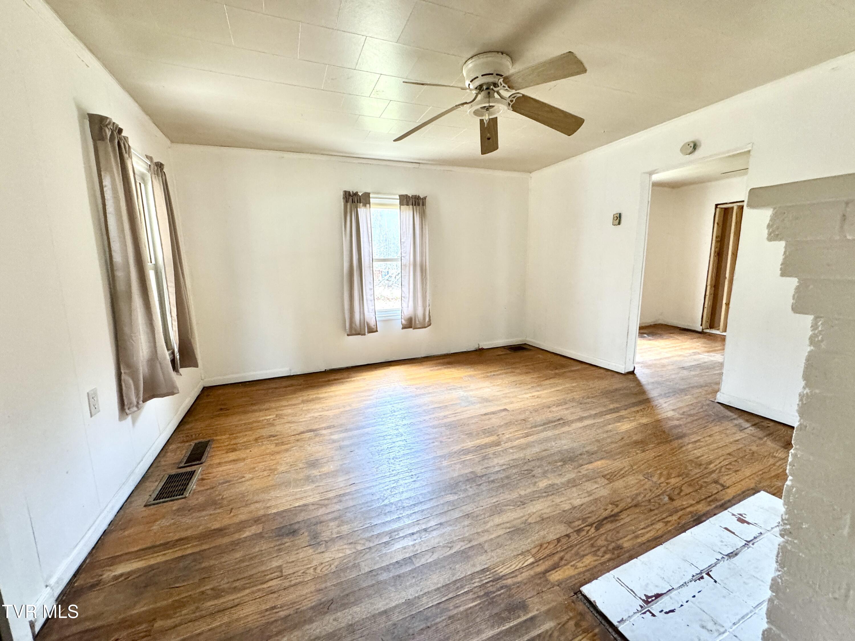 2342 Roda Road Appalachia, VA 24216 - Photo 28 of 30 EMPTY LIVING ROOM FROM FRONT BEDROOM