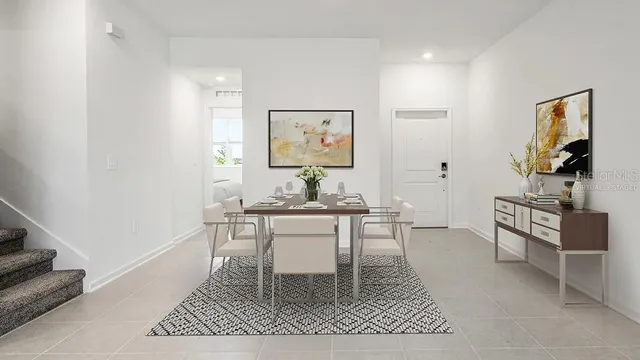 a view of a dining room with furniture