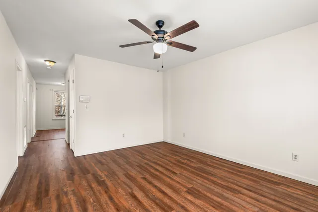 a view of cabinets with wooden floor