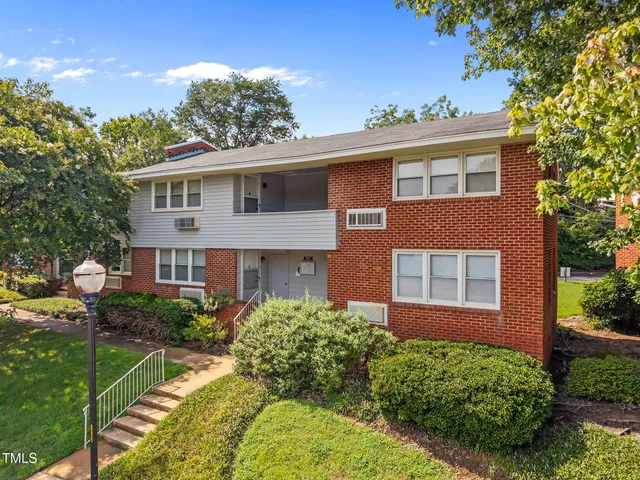 a stove top oven sitting inside of a kitchen