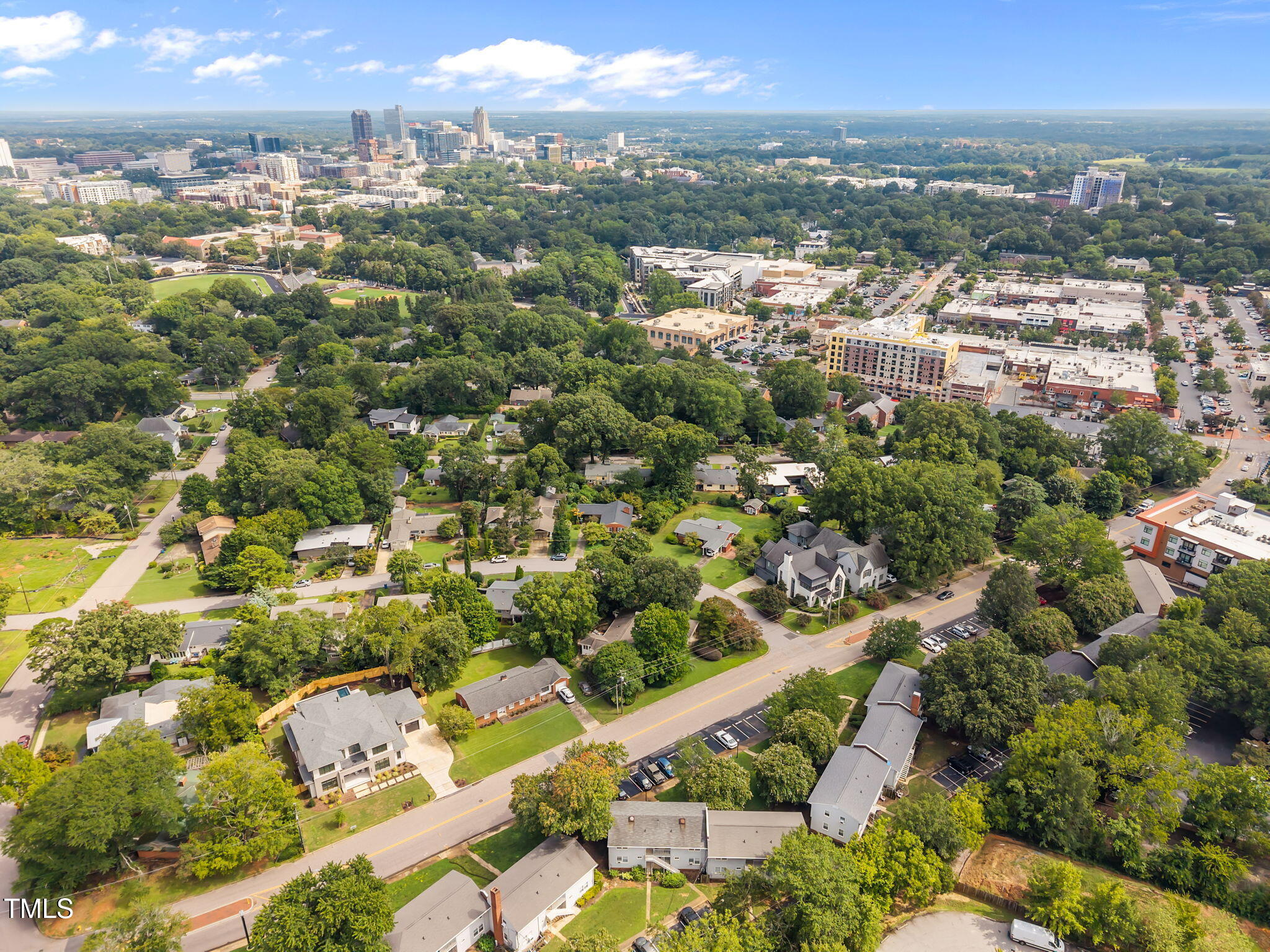 707 Daniels Street, Unit B Raleigh, NC 27605 - Photo 20 of 22 an aerial view of residential houses with city view
