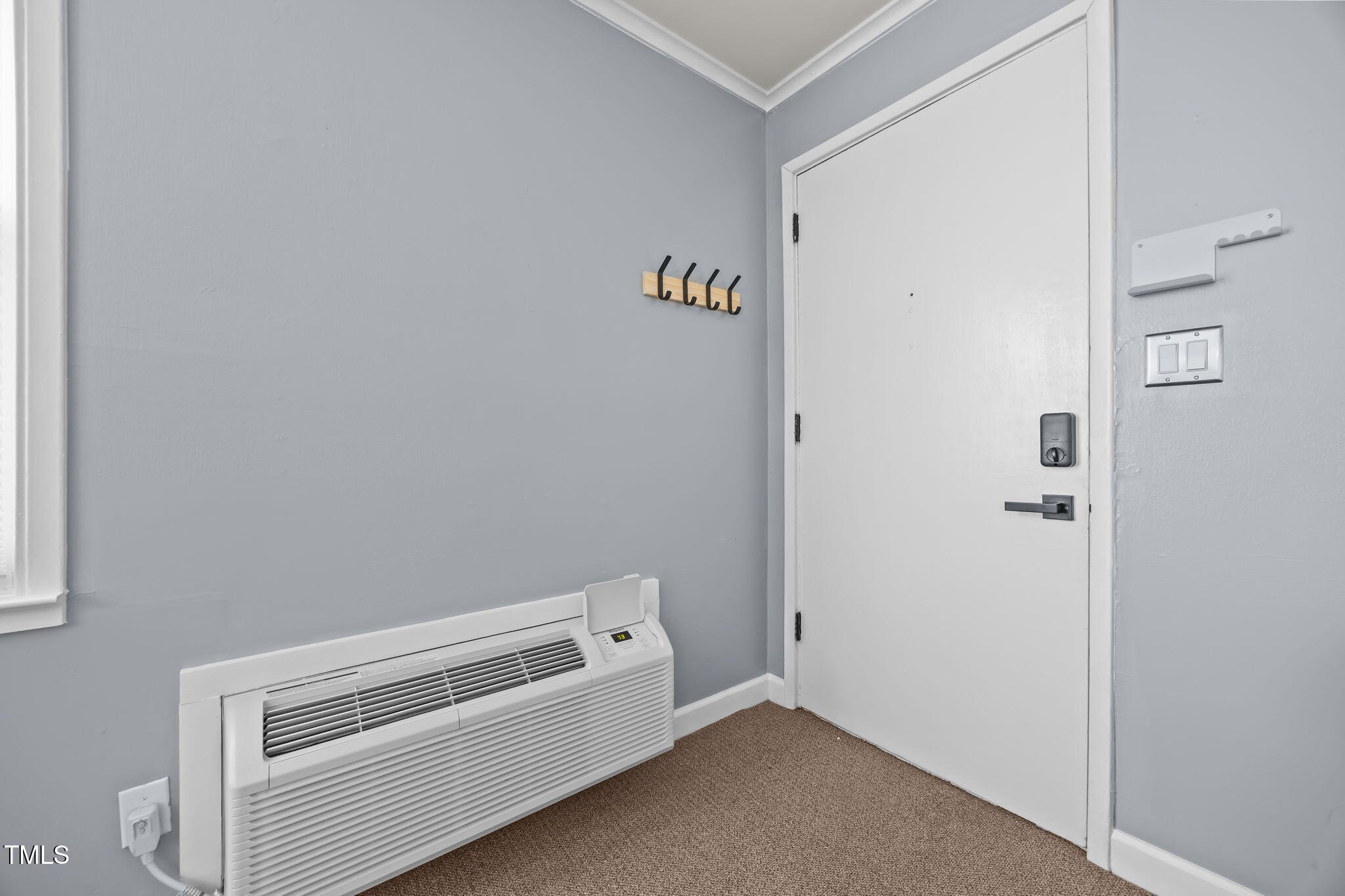 707 Daniels Street, Unit B Raleigh, NC 27605 - Photo 7 of 22 a room with storage and utility