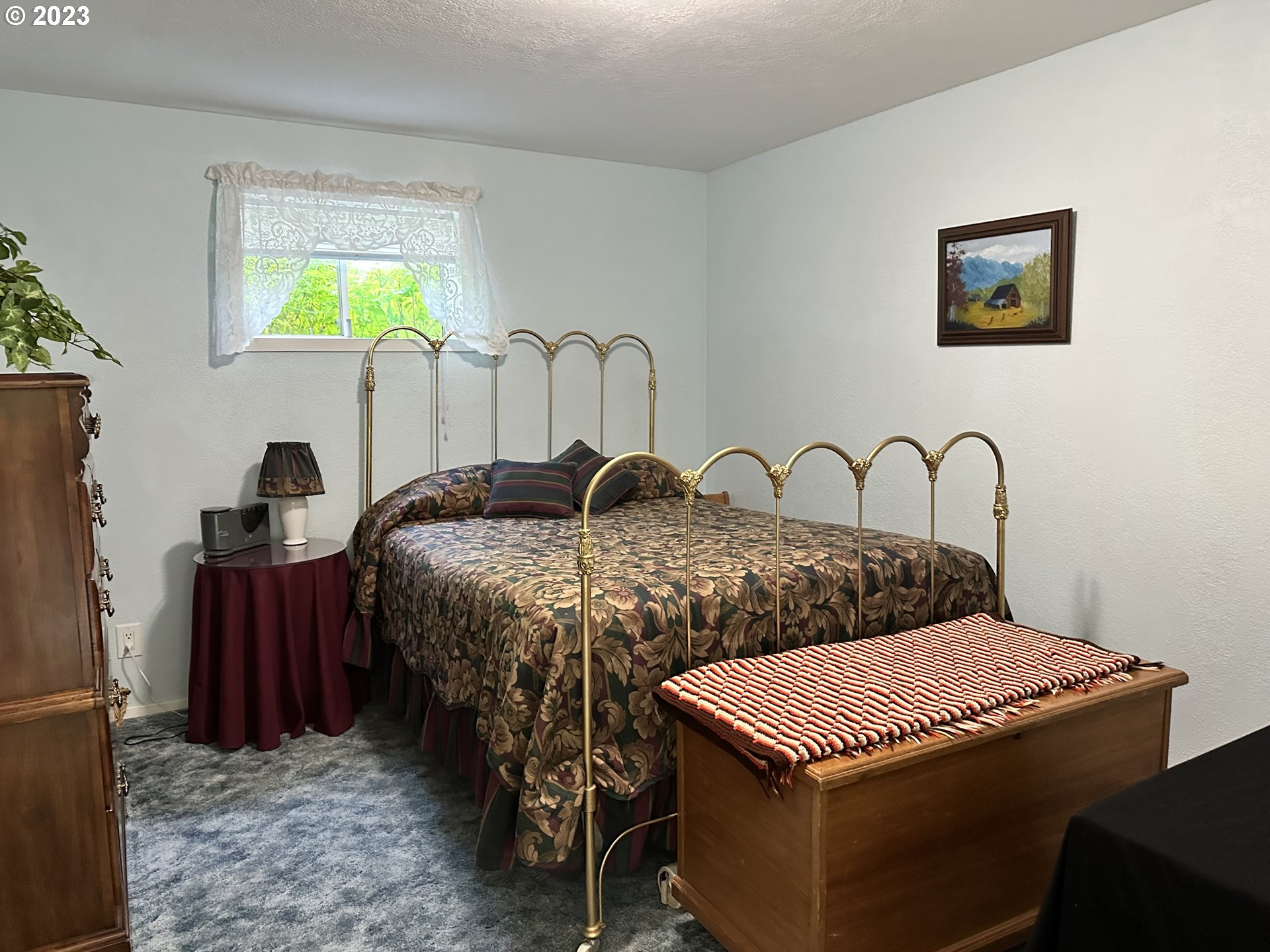 47786 Mathews Road Fossil, OR 97830 - Photo 14 of 29 a bed sitting in a bedroom next to a window