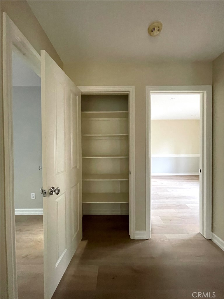 20 Arborside Irvine, CA 92603 - Photo 29 of 36 a view of walk in closet with empty racks