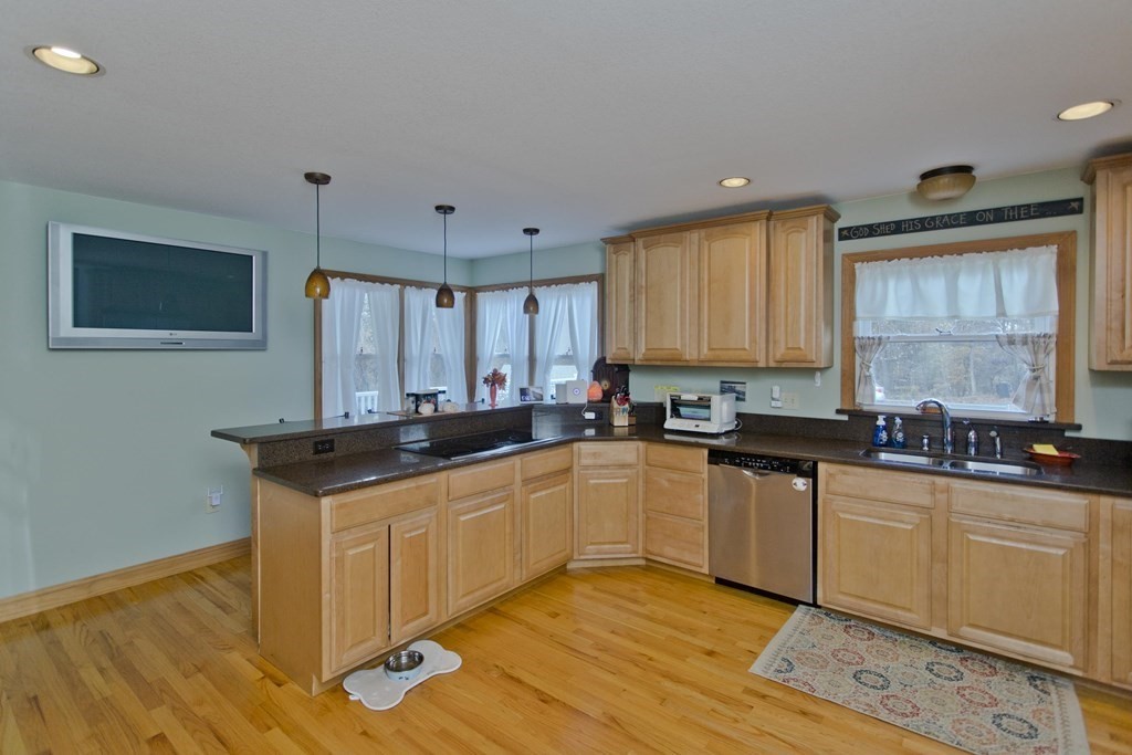 860 Plumtree Road Springfield, MA 01109 - Photo 13 of 21 a kitchen with stainless steel appliances a sink stove and cabinets
