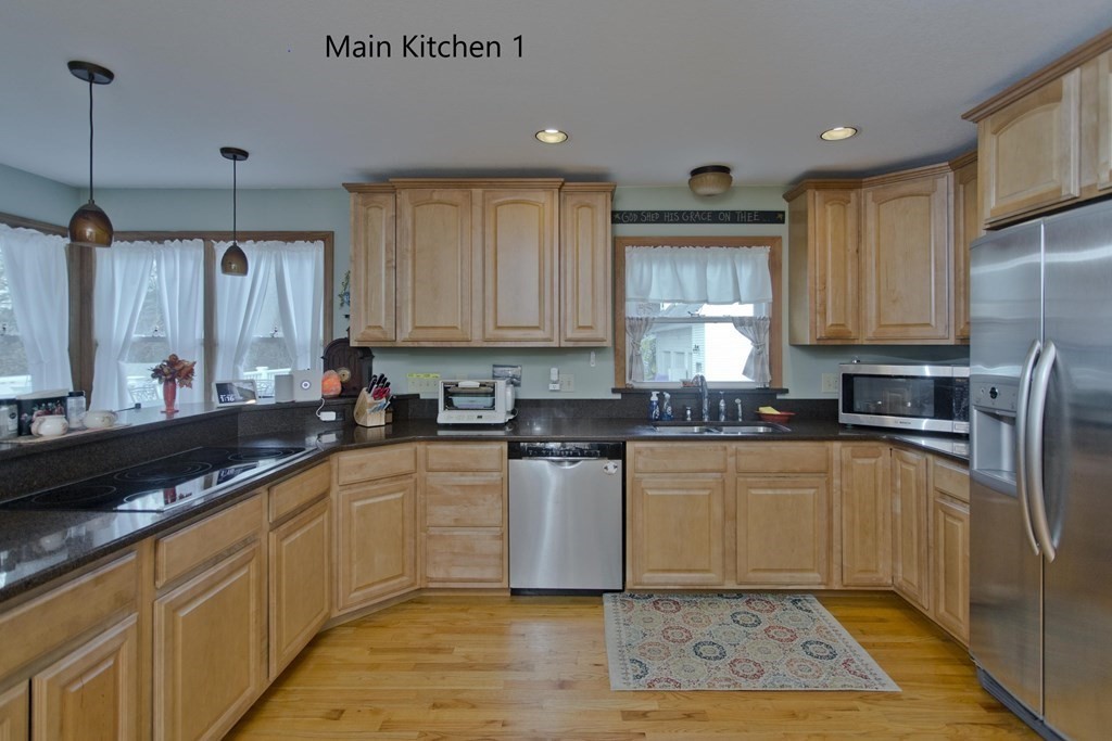 860 Plumtree Road Springfield, MA 01109 - Photo 14 of 21 a kitchen with a sink a window and cabinets