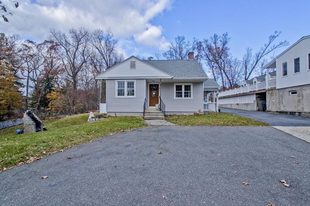 860 Plumtree Road Springfield, MA 01109 - Photo 3 of 21 a view of outdoor space yard and front view of a house