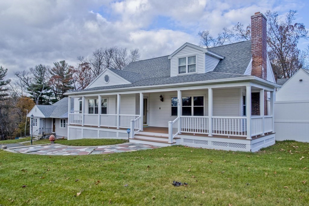 860 Plumtree Road Springfield, MA 01109 - Photo 7 of 21 a front view of a house with a yard
