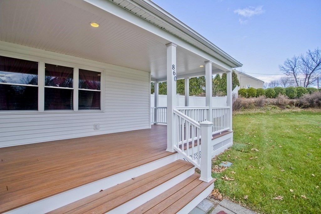 860 Plumtree Road Springfield, MA 01109 - Photo 8 of 21 a front view of a house with garden