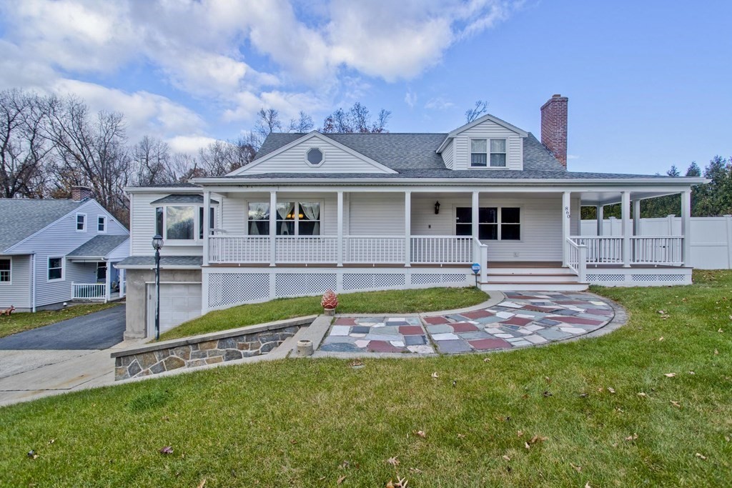 860 Plumtree Road Springfield, MA 01109 - Photo 10 of 21 a front view of a house with a yard