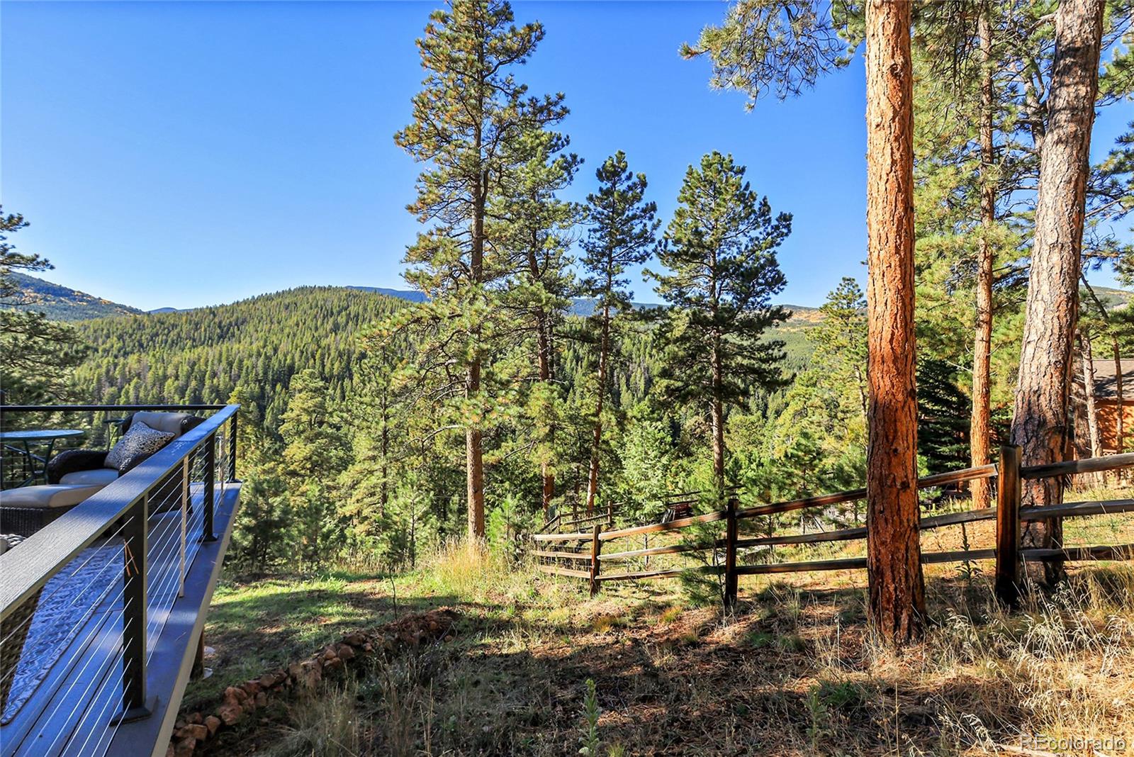 32857 Little Cub Road Evergreen, CO 80439 - Photo 44 of 47 a view of balcony with outdoor space
