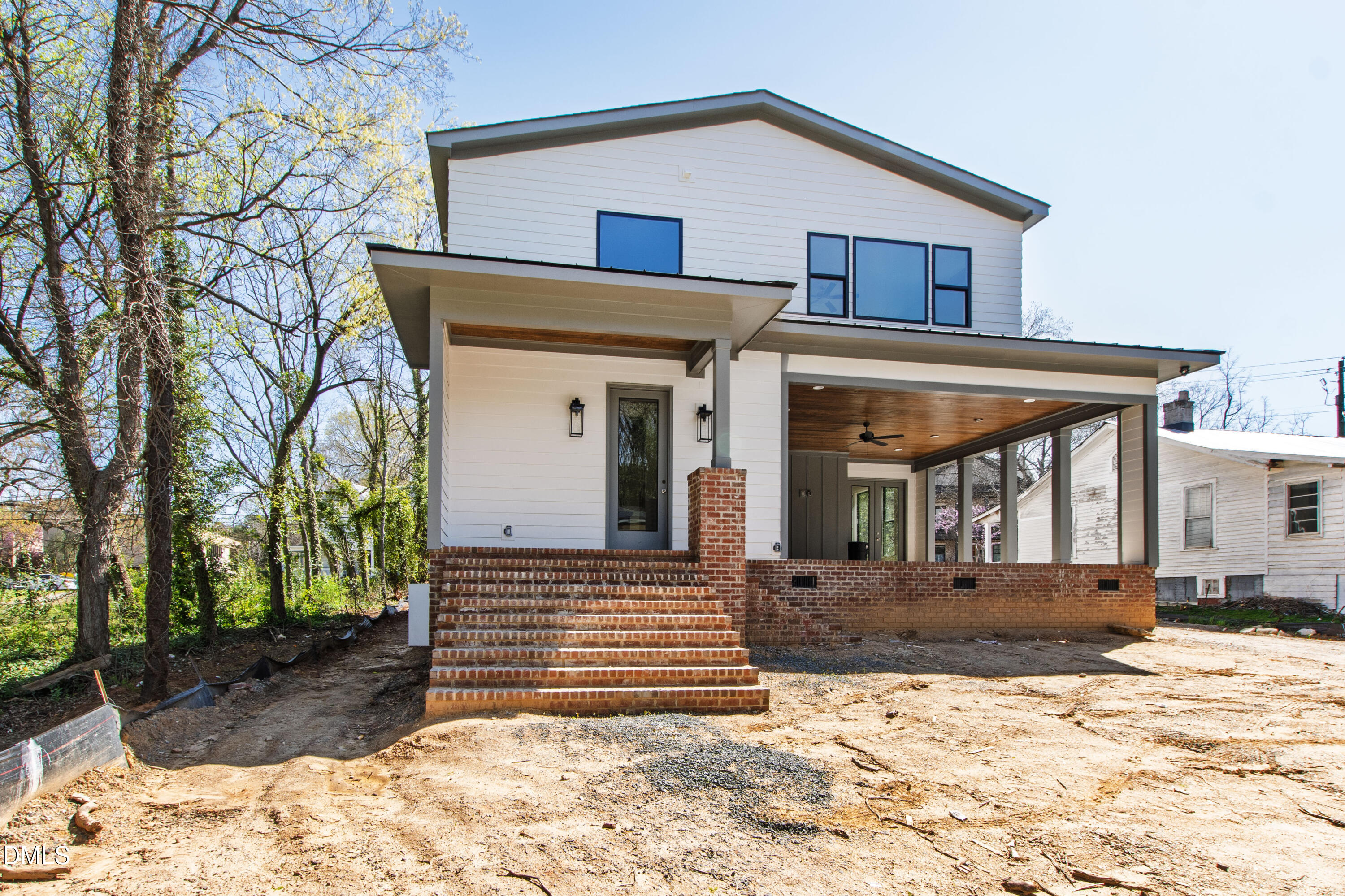909 Oberlin Road Raleigh, NC 27605 - Photo 47 of 59 a front view of a house with a yard