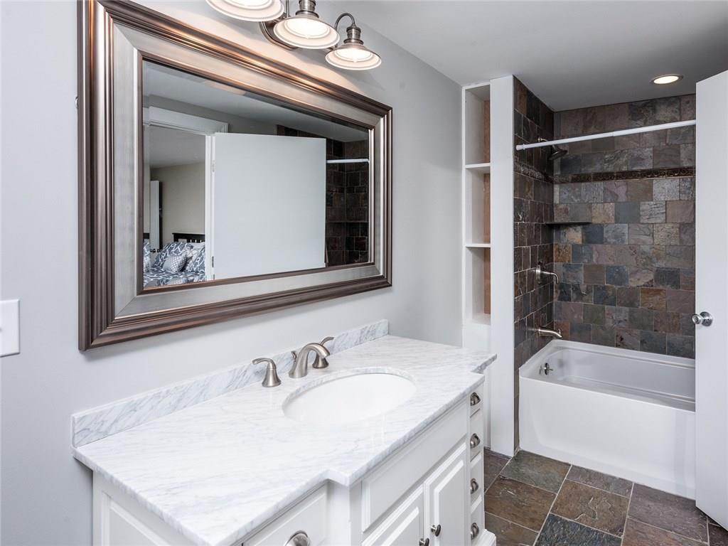 275 Shore Road, Unit 2 Ogunquit, ME 03907 - Photo 15 of 22 This stylish private bathroom is...