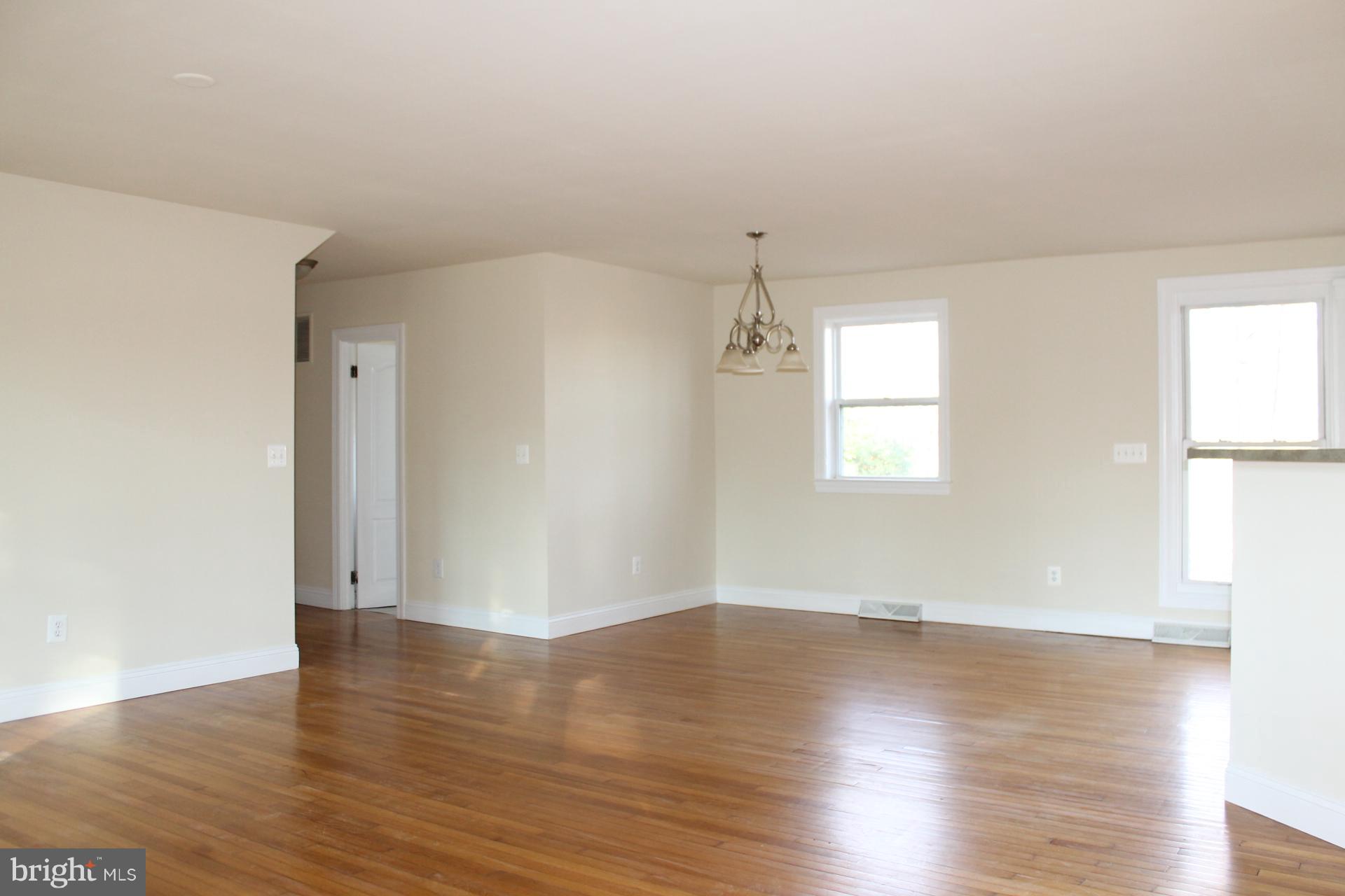 10529 Rixeyville Road Culpeper, VA 22701 - Photo 6 of 28 Living & Dining Room Combo Hardwood Floors