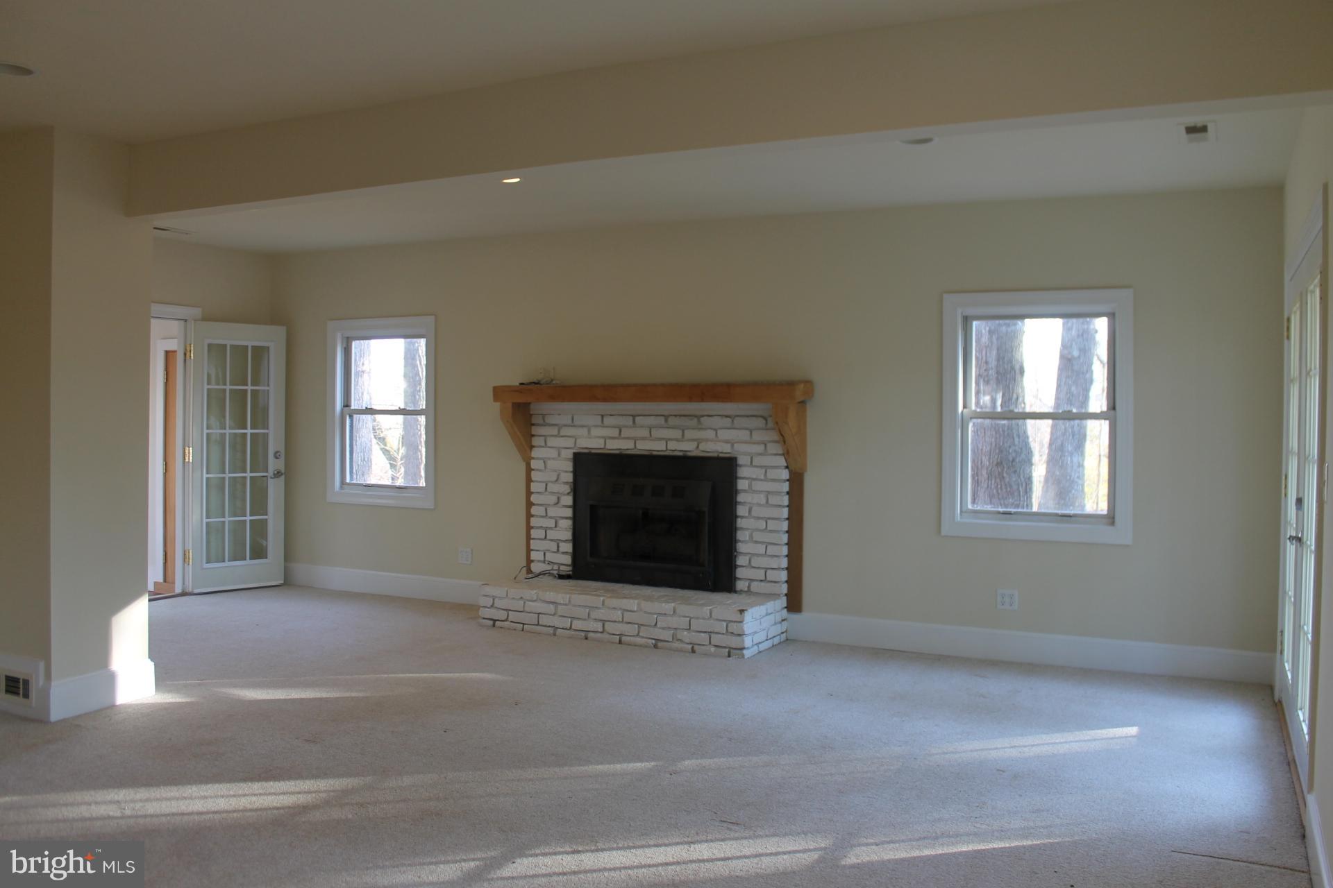 10529 Rixeyville Road Culpeper, VA 22701 - Photo 9 of 28 Family Room With Fireplace Ample Natural Light