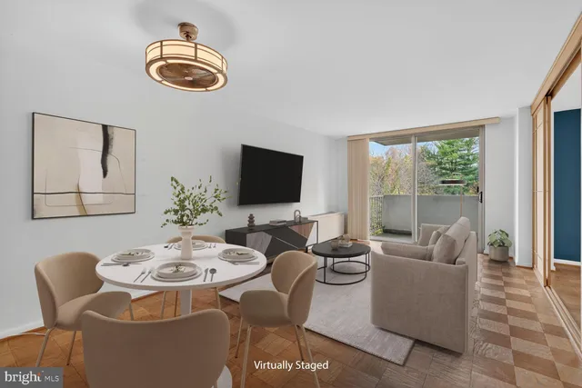 a view of a dining room with furniture window and outside view