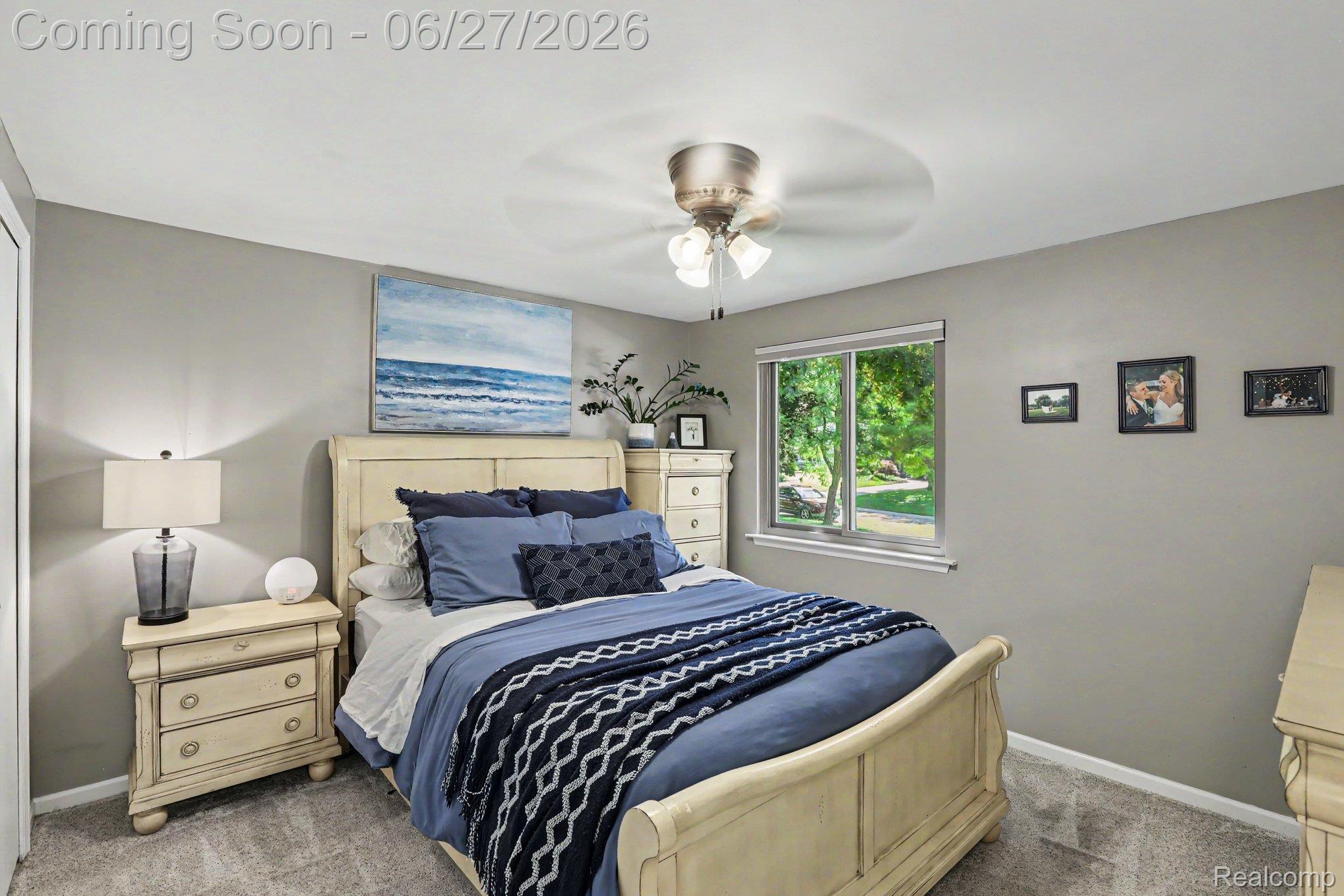 5134 Old Cove Road Clarkston, MI 48346 - Photo 18 of 27 Bedroom featuring a window with exterior greenery, neutral wall color, and carpet flooring