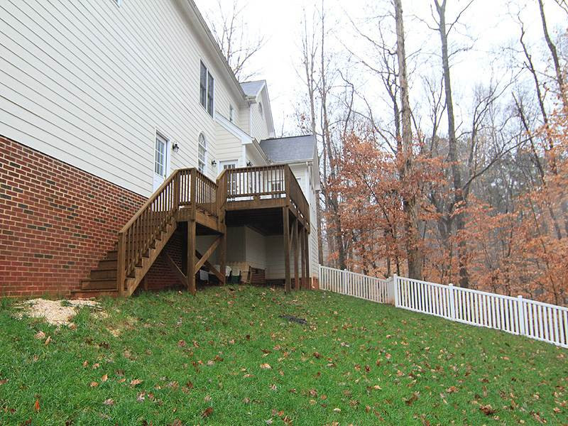2937 Sunnystone Way Raleigh, NC 27613 - Photo 24 of 25 Enjoy the Deck overlooking your yard set among the Trees. Back Yard View