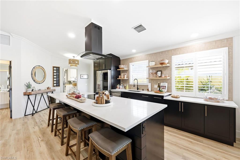 7575 Novara Court Naples, FL 34114 - Photo 12 of 49 Chef's Dream Kitchen with center island