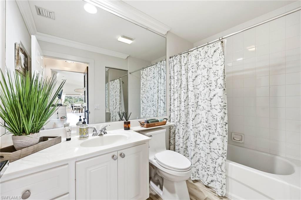 7575 Novara Court Naples, FL 34114 - Photo 28 of 49 Guest Bathroom with Shower/Tub Combo