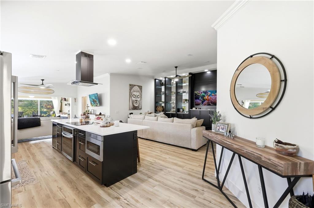 7575 Novara Court Naples, FL 34114 - Photo 10 of 49 Completely remodeled Kitchen with center Island.