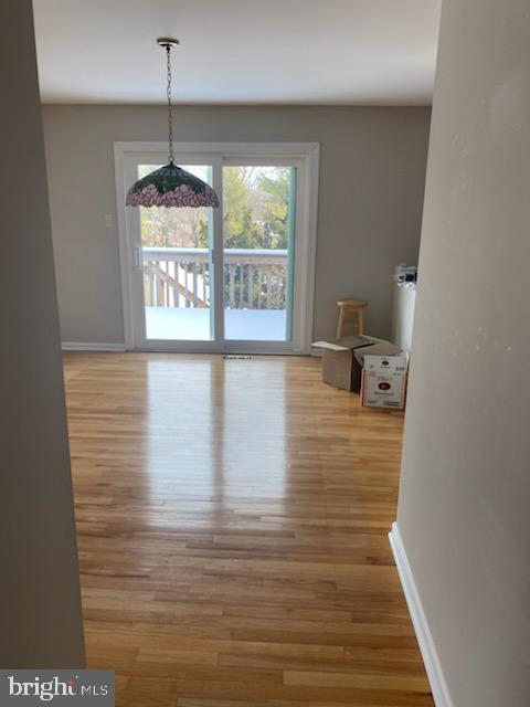 43 Hunters Run Newtown Square, PA 19073 - Photo 17 of 37 a view of empty room with window and chandelier fan