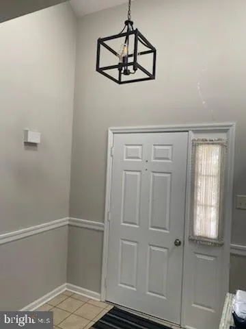 a view of a decorative light in a hallway