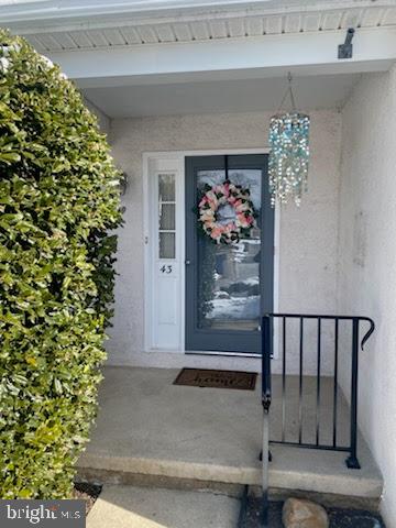 43 Hunters Run Newtown Square, PA 19073 - Photo 3 of 37 a view of entryway with flower pot