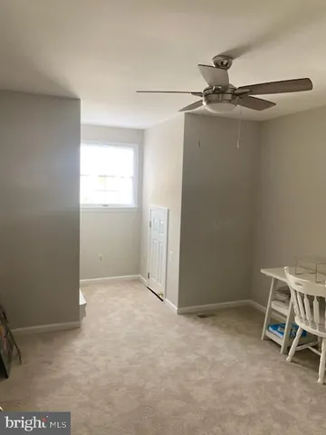 an empty room with a workbench