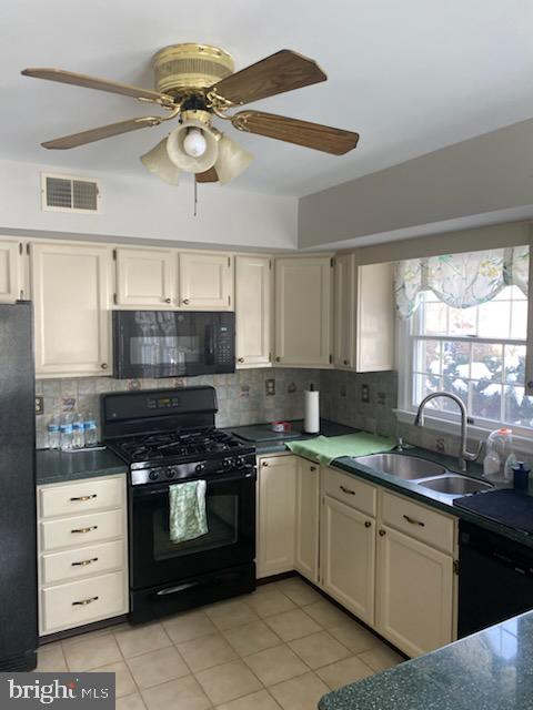43 Hunters Run Newtown Square, PA 19073 - Photo 6 of 37 a kitchen with a stove microwave and cabinets