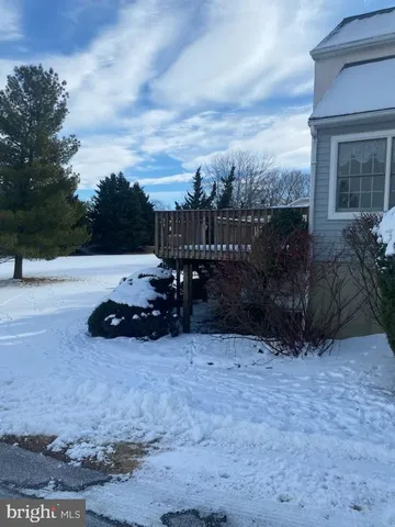 a view of a terrace with yard