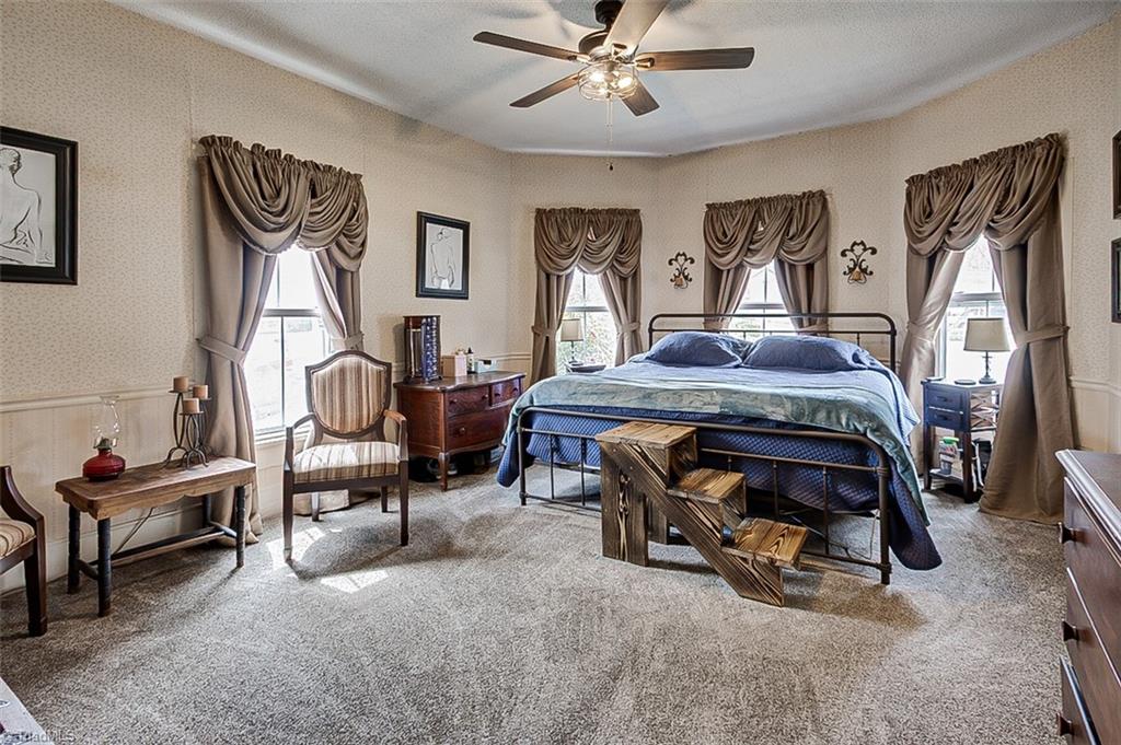 303 Coleridge Road Ramseur, NC 27316 - Photo 14 of 36 Primary Bedroom with Lots of Open Windows