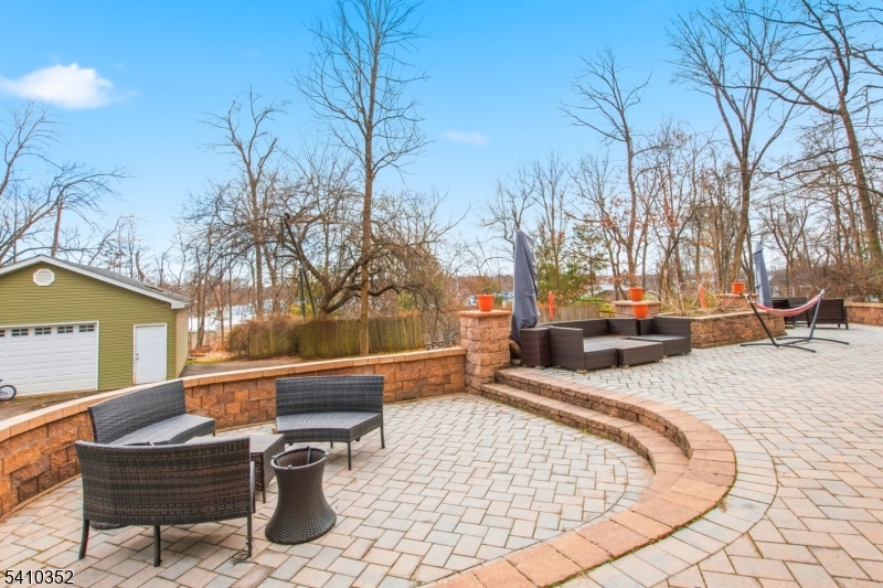 31 Blue Ridge Avenue Green Brook, NJ 08812 - Photo 22 of 28 a view of a backyard with sitting area
