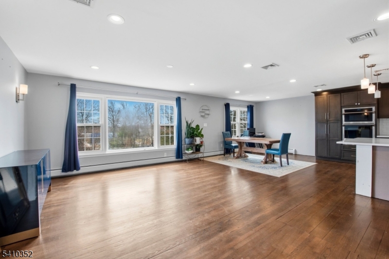 31 Blue Ridge Avenue Green Brook, NJ 08812 - Photo 7 of 28 a living room with furniture and a wooden floor