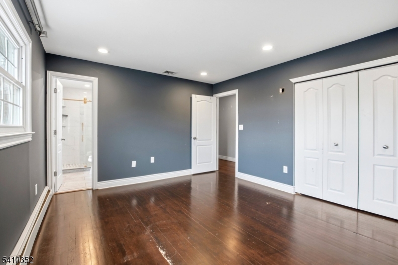 31 Blue Ridge Avenue Green Brook, NJ 08812 - Photo 9 of 28 a view of an empty room with wooden floor