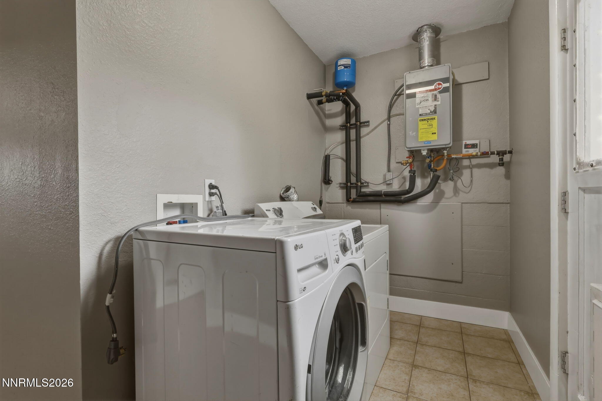 3260 Heights Drive Reno, NV 89503 - Photo 17 of 40 a utility room with dryer and washer