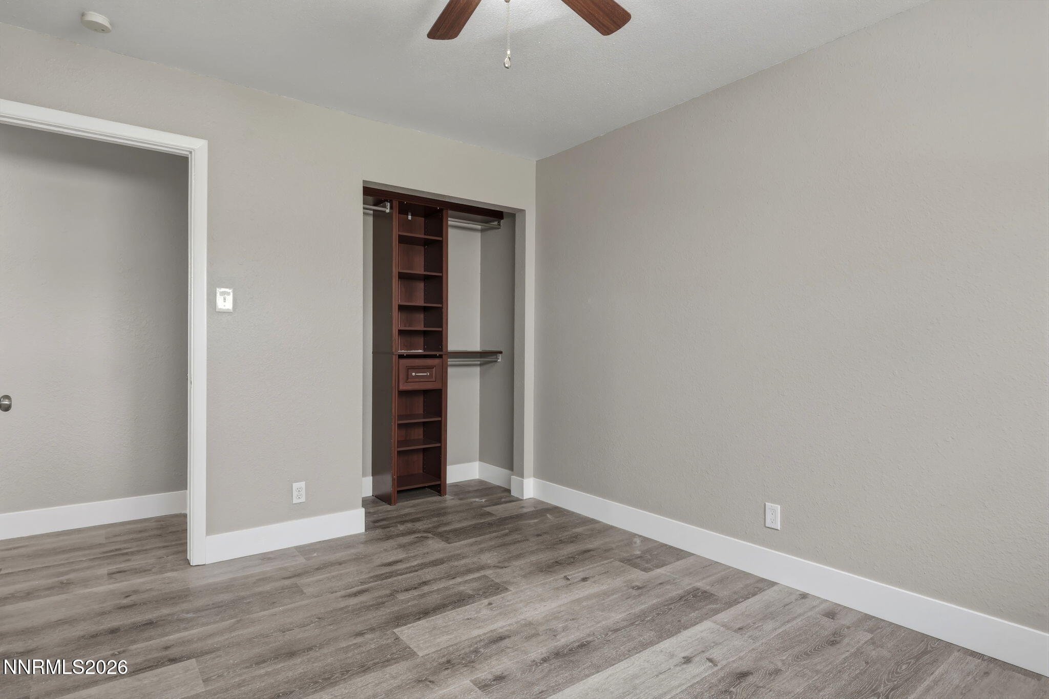 3260 Heights Drive Reno, NV 89503 - Photo 23 of 40 a view of an empty room with wooden floor and closet