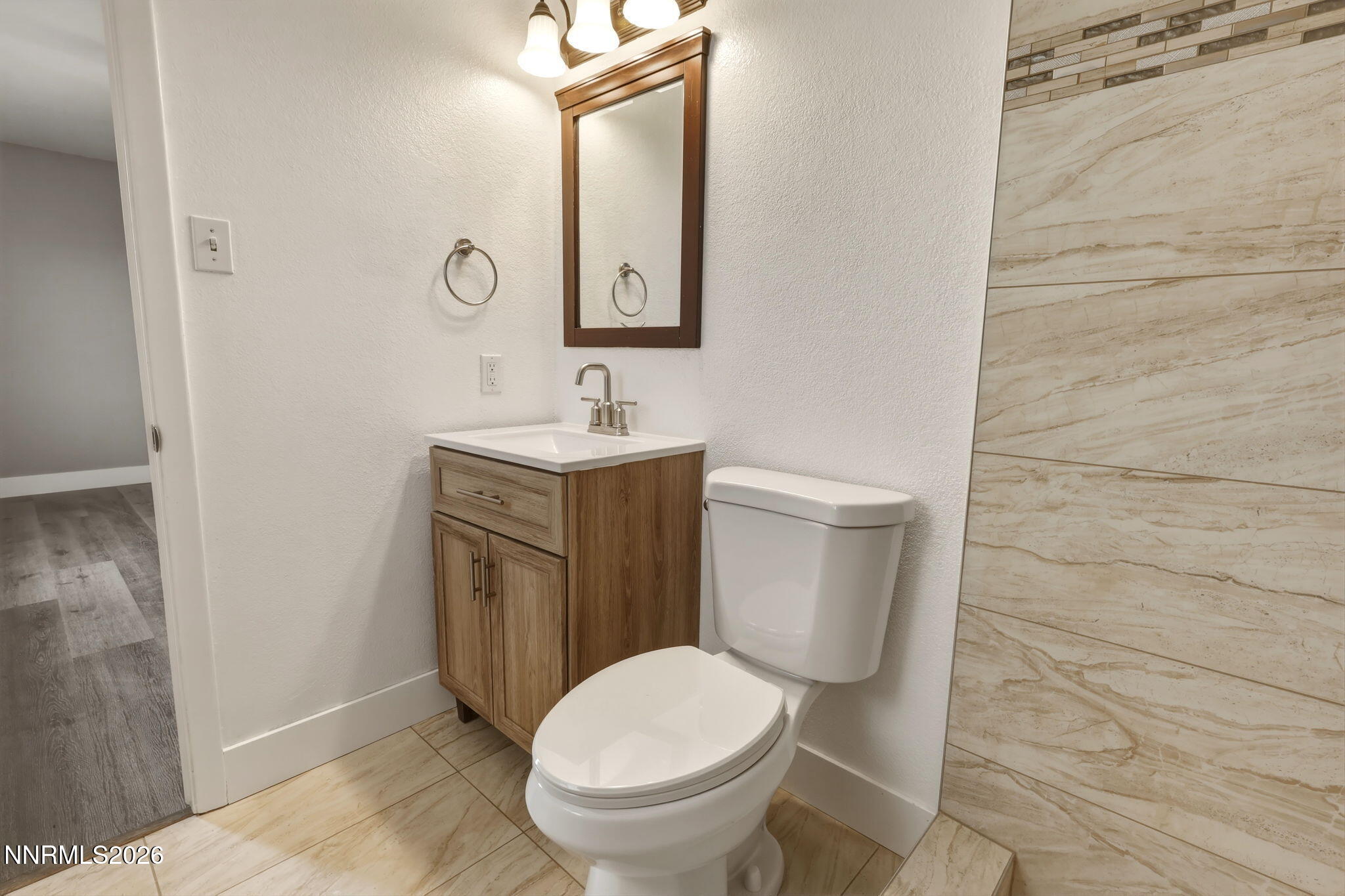3260 Heights Drive Reno, NV 89503 - Photo 25 of 40 a bathroom with a toilet a sink and mirror