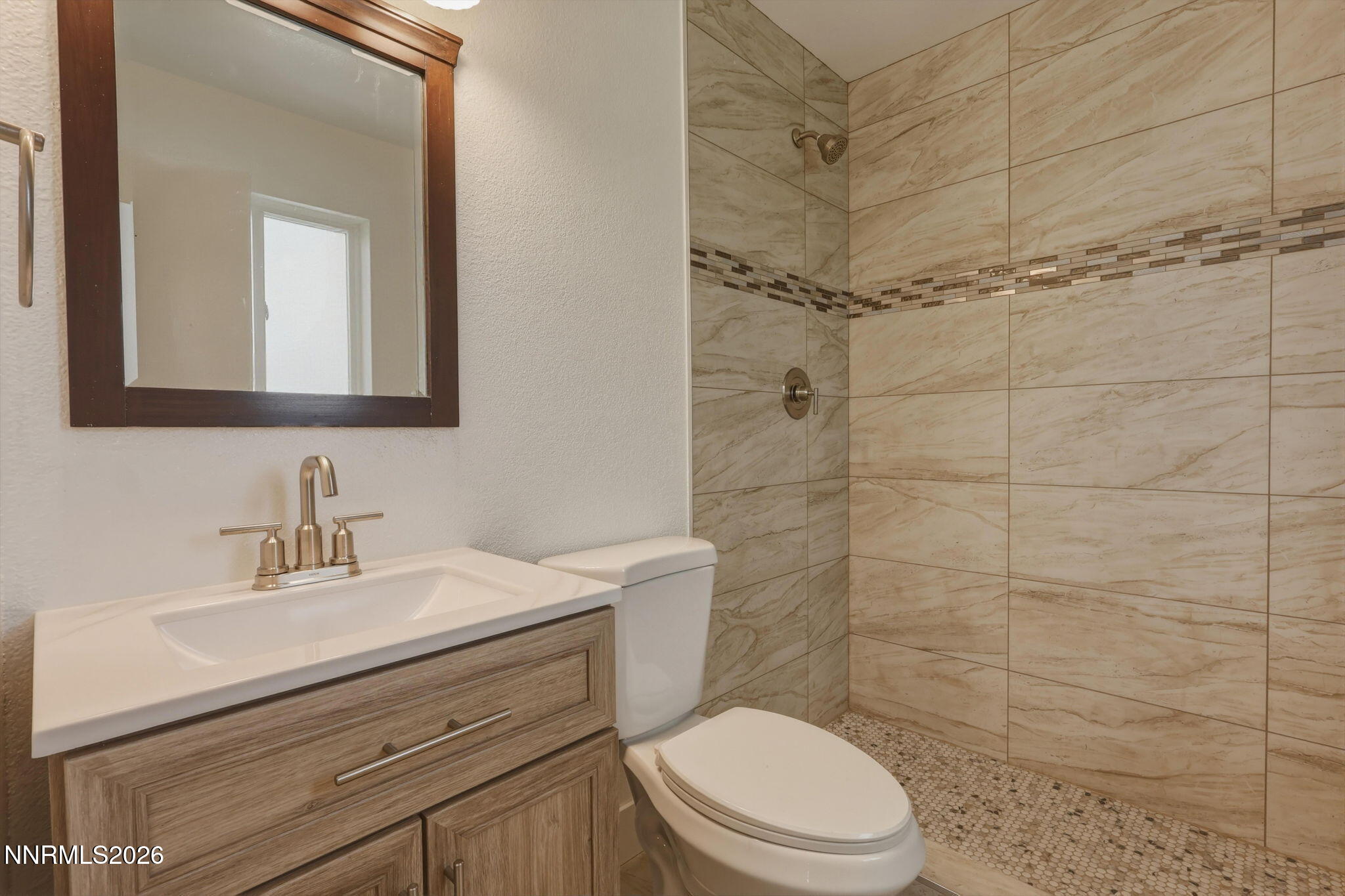 3260 Heights Drive Reno, NV 89503 - Photo 28 of 40 a bathroom with a sink a toilet and shower